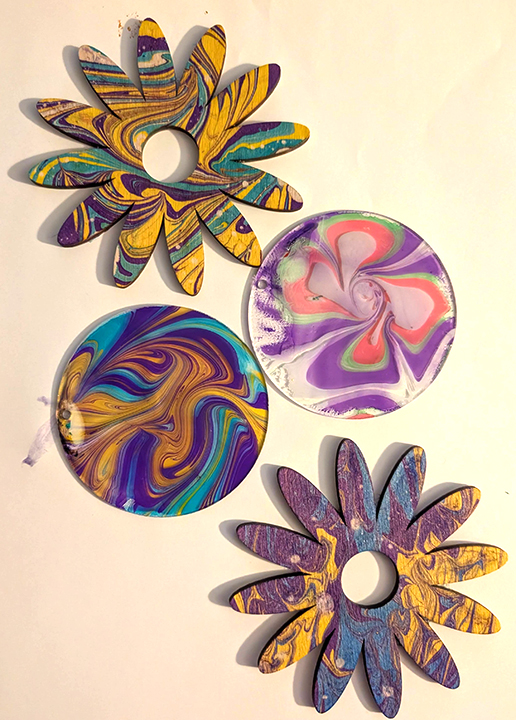 Wooden flowers and circles with water marbling designs